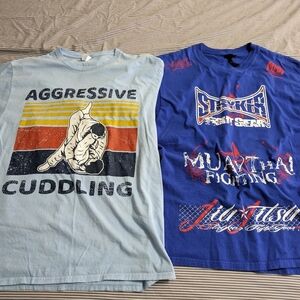 Two MMA shirts